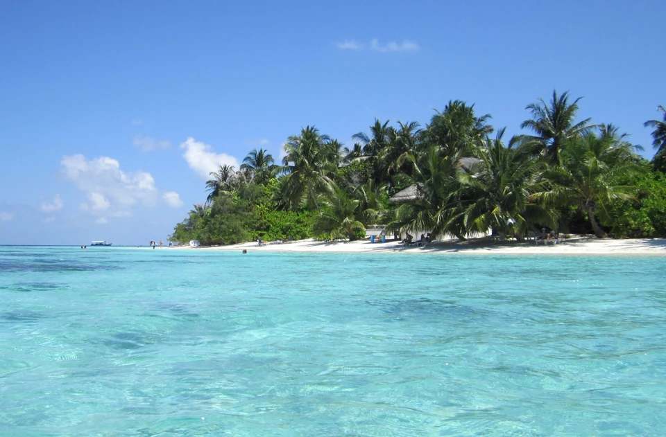 Западная лагуна Bandos Maldives на архивной фотографии 2013 года